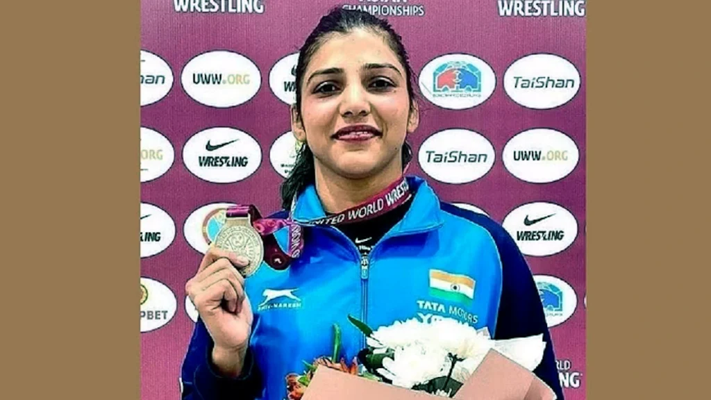 Olympics: Wrestler Nisha is learning the nuances of wrestling from Iran's coach Aamir in Karnataka.